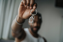 Man Holding House Key Ring