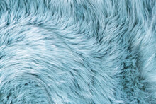 Trendy Artificial Fur Texture. Fur Pattern Top View. Blue Fur Background. Texture Of Blue Shaggy Fur. Wool Texture. Flaffy Sheepskin Close Up