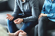 © terovesalainen - Mediator or family counsel with couple in therapy meeting. Divorce lawyer, marriage counselor, psychologist or doctor interview upset man and woman. Sad people with anxiety. Session with psychiatrist.