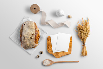 Blank cards on the serving board with bread, bakery branding mockup, empty space to display your logo or design.