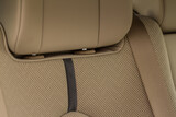 Fototapeta Do akwarium - High angle view of modern car fabric seats. Close-up car seat texture and interior details. Detailed image of a car pleats stitch work.