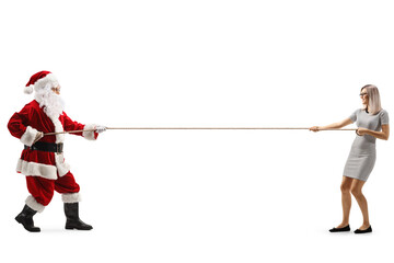 Poster - Full length profile shot of a young woman and santa claus pulling a rope