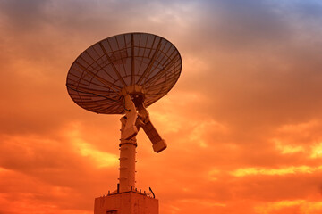 Wall Mural - the silhouette of a radio telescope observatory