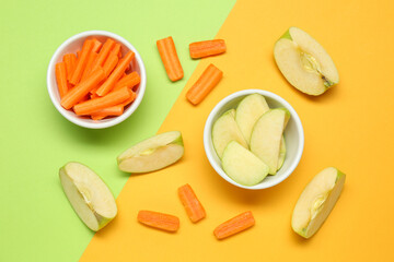 Wall Mural - Fresh sliced carrot and apple on color background, flat lay. Finger food