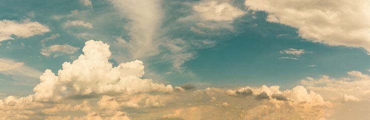 Wall Mural - summer cloud sky panorama with fleece clouds, vibrant color panoramic sky with cloud on a sunny day
