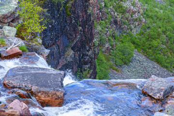 Canvas Print - Stream that's running out at a cliff face