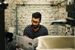 © Rawpixel.com - Man in a restroom reading newspaper