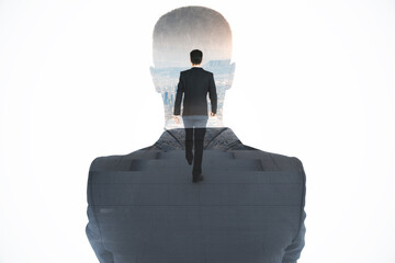 Wall Mural - abstract image of attractive european business man walking on abstract stairs on white background wi