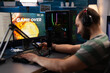 © DC Studio - Person losing video games on live stream with chat. Man streaming online gameplay on computer with headset and microphone. Streamer with headphones broadcasting games on social media.
