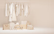 Clothes on grunge background, shelf on cream background. Collection of clothes hanging on a rack in neutral beige colors. 3d rendering, store and bedroom concept	
