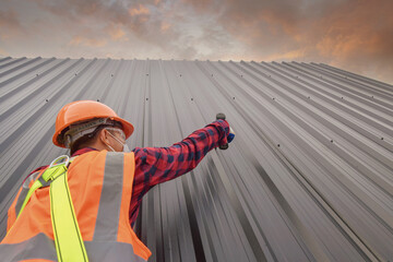 Wall Mural - Roofer Construction worker install new roof,Roofing tools