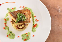 Tasty Healthy Fish Fillet With Potato Puree With Dried Tomatoes And Wild Garlic Sauce