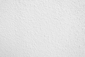 Seamless texture of white cement wall a rough surface, with space for text, for a background..