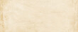 © daboost - Old parchment paper texture background. Banner