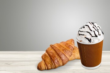 Poster - Fresh baked breakfast croissants with cup hot espresso coffee