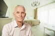 © BillionPhotos.com - Portrait of beautiful smiling senior man posing at home room