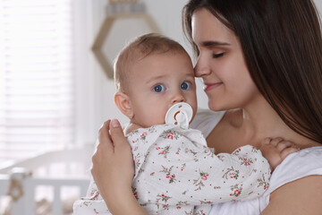 Canvas Print - Happy young mother with her baby daughter at home