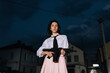 © Cavan Images - A Young Woman Holding a Gun