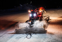 Snowcat Ratrack Machine Making Night Snow At Ski Resort