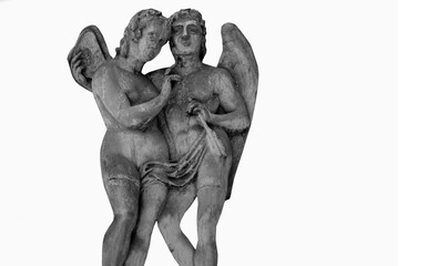 Cupid and Psyche. An ancient stone statue against white background.