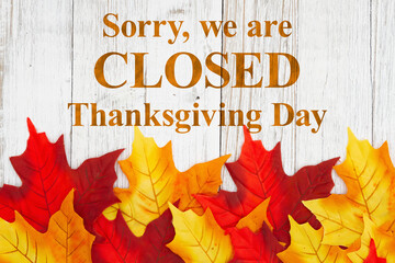 Wall Mural - Closed Thanksgiving Day message with autumn leaves
