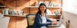 © (JLco) Julia Amaral - Businesswoman smiling while working from home
