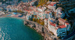 © AmazingAerialAgency - Aerial view of Amalfi, a beautiful and touristic town along the Amalfi coastline, Salerno, Campania, italy.