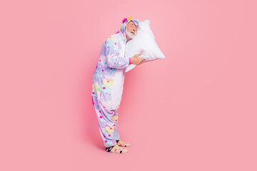 Sticker - Full length body size view of attractive dreamy calm grey-haired man sleeping on pillow isolated over pink color background