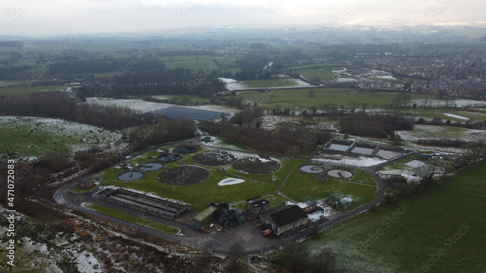 Aerial view of water treatment works creating patterns in the landscape ...