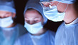 © lenets_tan - Team surgeon at work in operating room