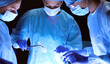 © lenets_tan - Team surgeon at work in operating room.