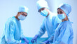 © lenets_tan - Team surgeon at work in operating room.