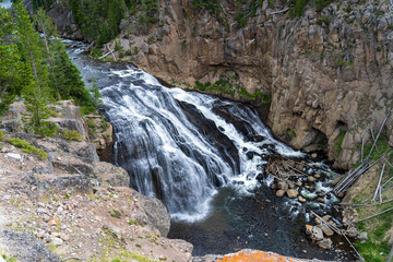 Gibbon Falls in Yellowstone National Park on a cloudy summer evening