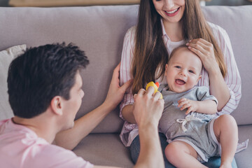 Poster - Photo of glad little funny kids enjoy father game wear casual outfit in comfortable apartment home indoors