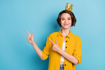 Poster - Photo of promoter prom queen lady direct fingers empty space wear crown yellow shirt isolated blue color background