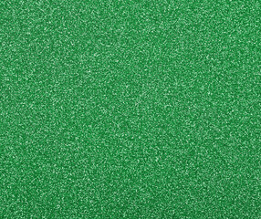 Wall Mural - Abstract background texture of green glitter