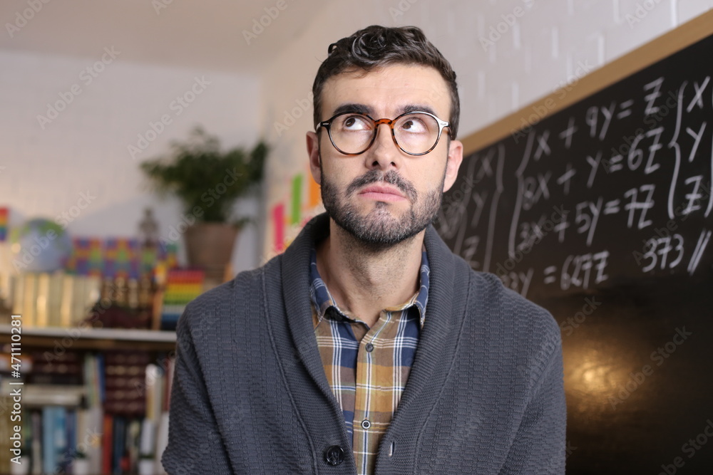 Math Teacher Thinking In Classroom Stock Photo Adobe Stock