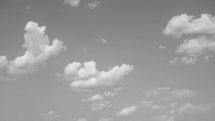 Wall Mural - 4k black and white timelapse of beautiful blue sky nad white clouds flying. abstract natural video b