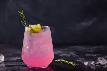 Refreshing pink drink or cocktail with ice