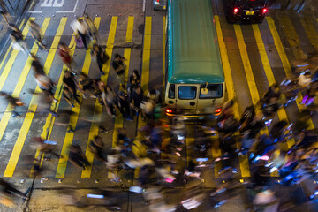 Wall Mural - Top down view of people cross the street