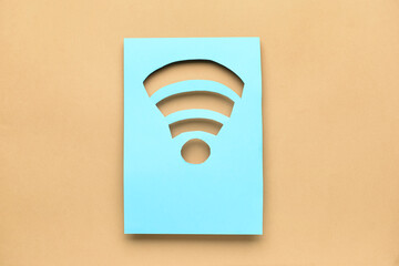 WiFi symbol made from paper on beige background