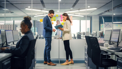 Aufkleber - Young Manager Creating Project Plan with Experienced Colleague on Office Wall with Paper Notes. Employees Discuss Business, Financial and Marketing Projects. Specialists Work in Diverse Team.