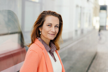 Elegant middle-aged businesswoman with a friendly smile