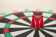 Men on center of top score target dartboard background. Recruitment, find the right man on the right job, headhunter concept. Human resource (HR) recruitment select best applicant for company.