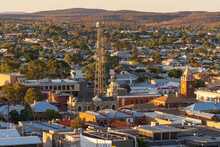 Elevated View Over The Business District Of An Outback City With A Large Tower
