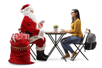 Poster - Santa claus drinking coffee and sitting at a table with a young female student