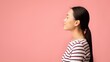 © Prostock-studio - Profile Portrait Of Young Calm Asian Female Standing With Closed Eyes Over Pink Background, Side View Shot Of Relaxed Peaceful Millennial Korean Woman Posing In Studio, Panorama With Copy Space