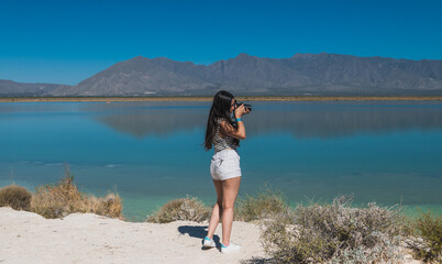 Girl explorer photographing the 