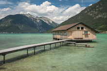 Old Wooden Bathhouse At Achensee Lake Shore On A Cloudy Summer Day, Pertisau, Tyrol, Austria