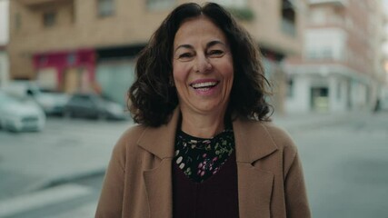 Poster - Middle age hispanic woman smiling confident standing at street